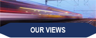 Image of a speeding commuter train, with the words "Our Views"